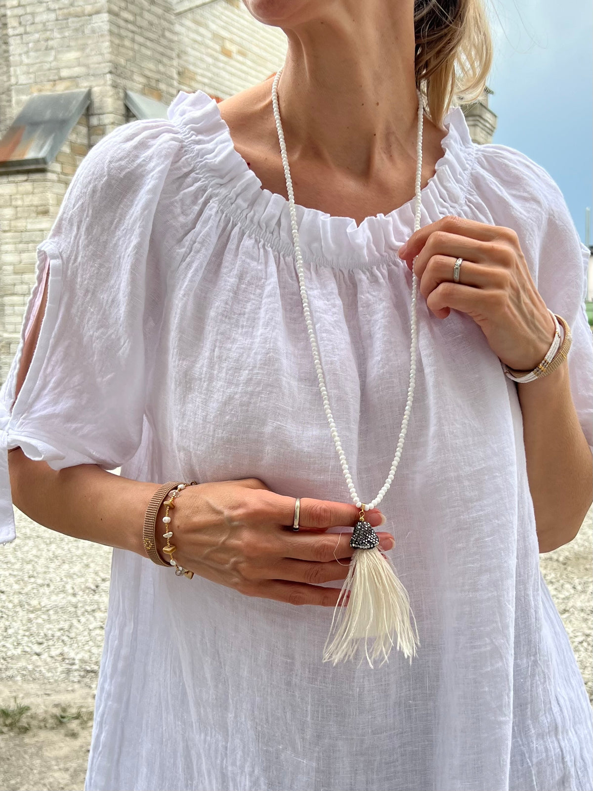 Kaulakoru tupsulla, valitse väri