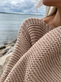 Mountain Village merino wool sweater, off-white