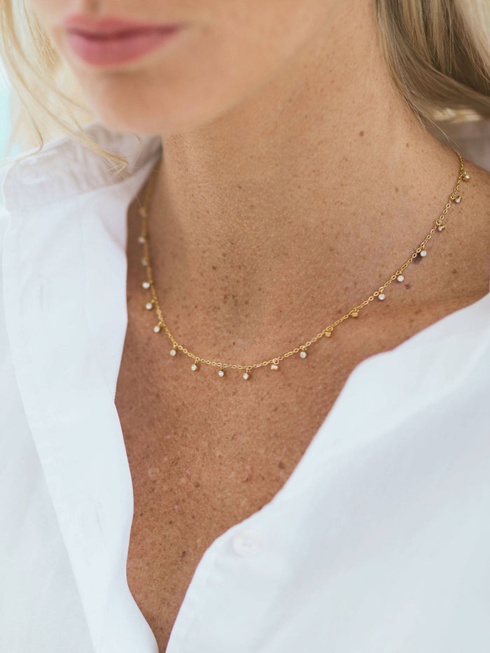 Chrystal Charms necklace, gold